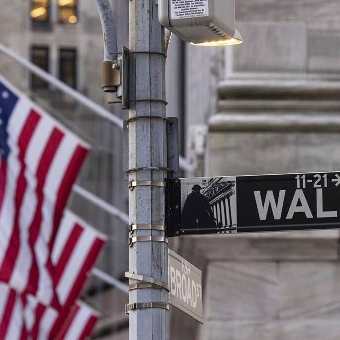 Stock market today: Wall Street hangs near record highs at the start of a busy week